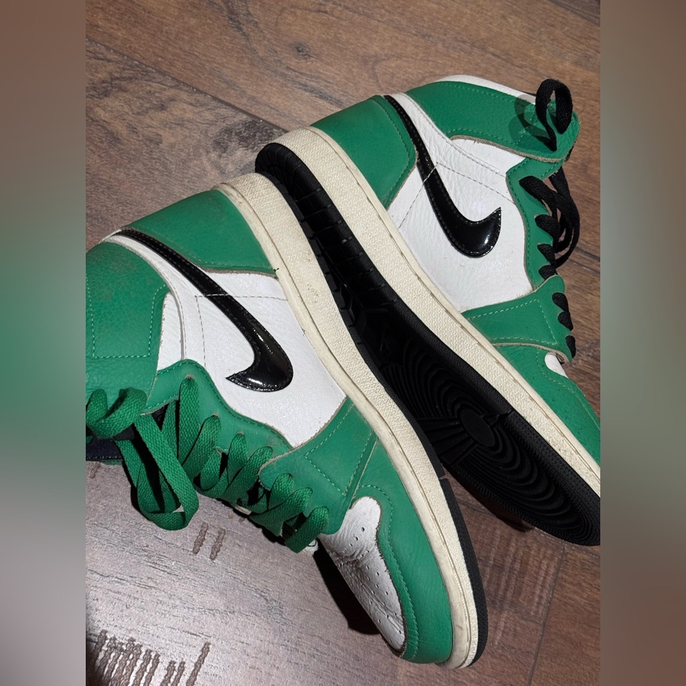 Green and White High-Top Air Jordan Sneakers